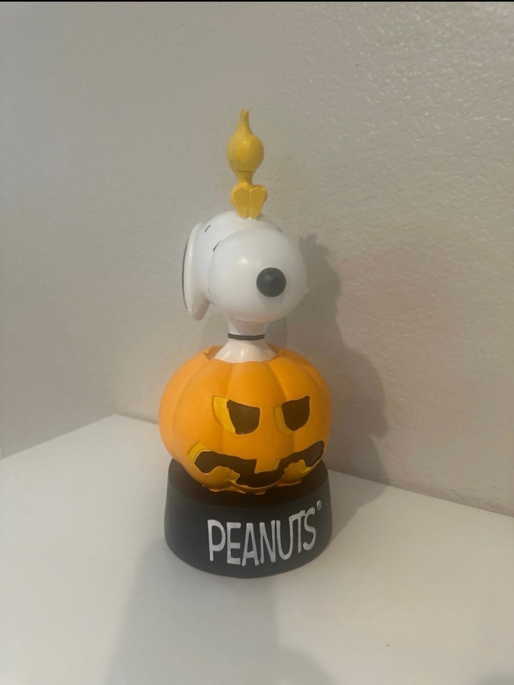 Peanuts Snoopy on Pumpkin Figurine - White, Orange, Yellow, Black